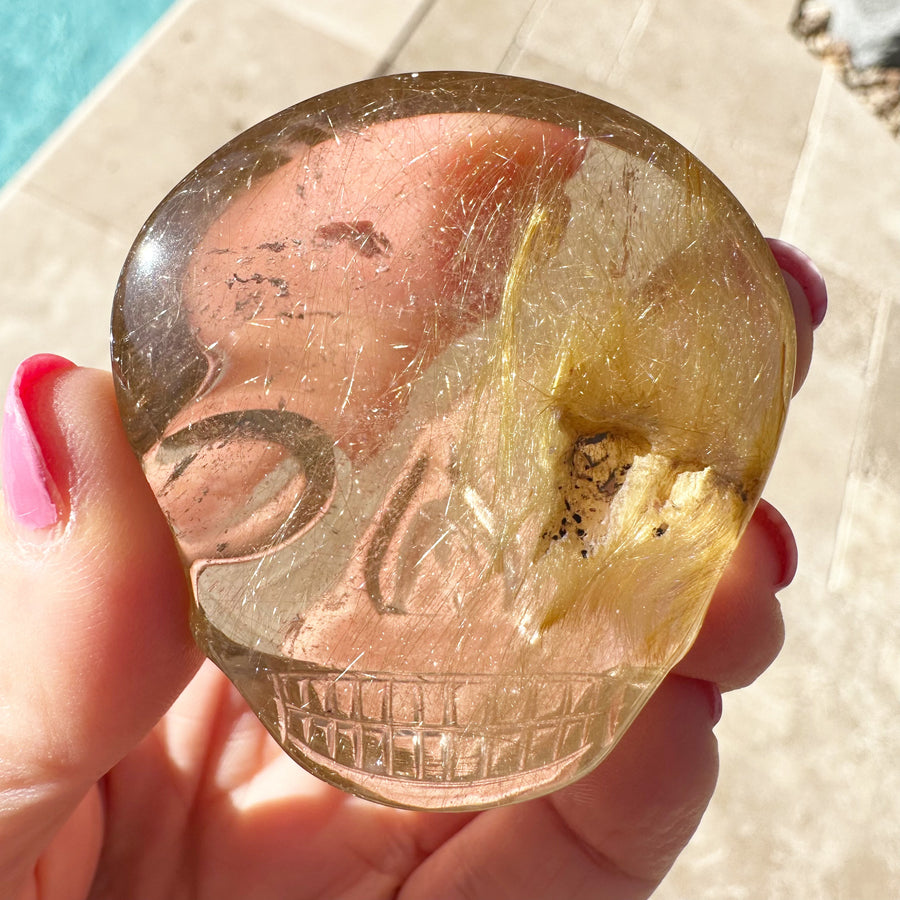 Golden Rutile Quartz Palm Crystal Skull Carved by Leandro de Souza