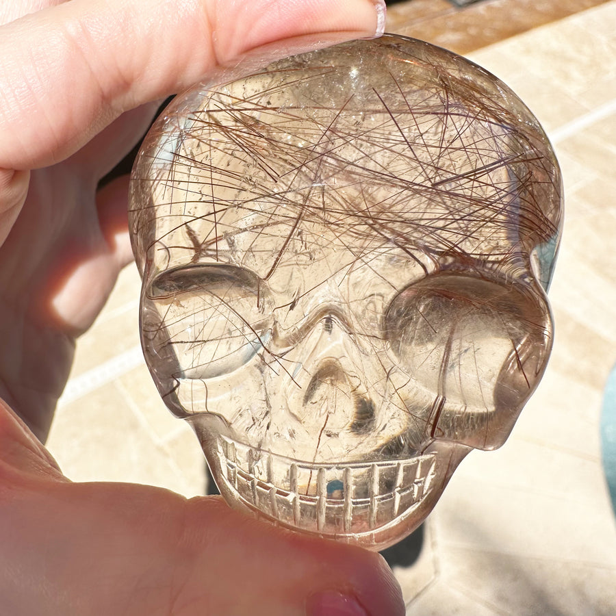 Pink Rutile Quartz Palm Crystal Skull Carved by Leandro de Souza