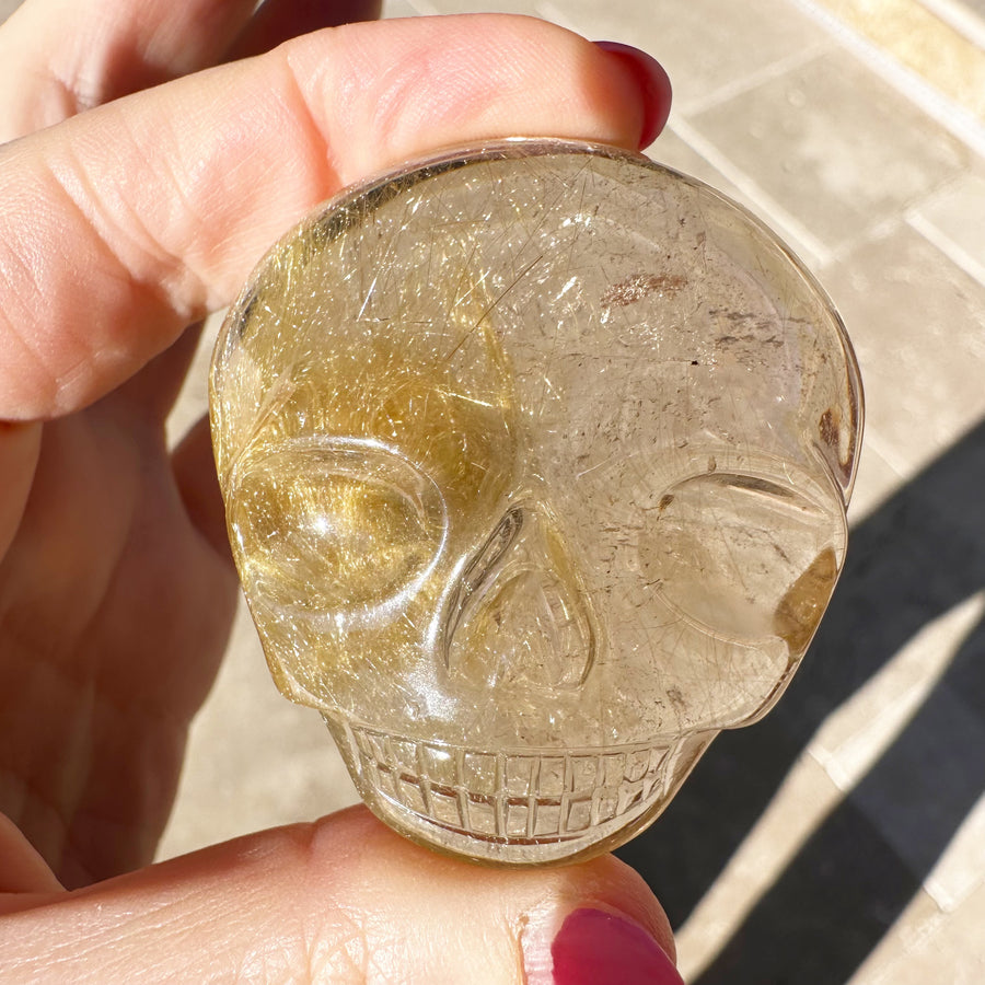 Golden Rutile Quartz Palm Crystal Skull Carved by Leandro de Souza