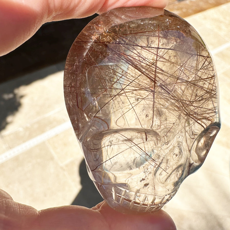 Pink Rutile Quartz Palm Crystal Skull Carved by Leandro de Souza