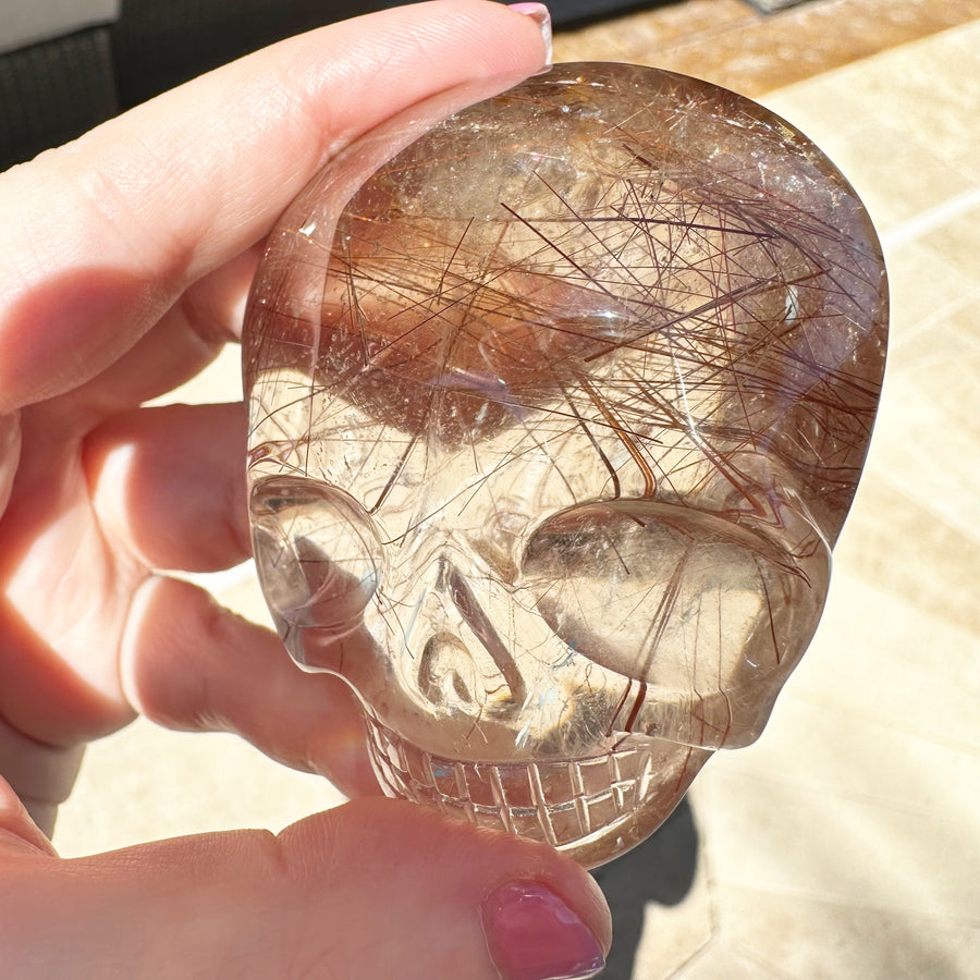 Pink Rutile Quartz Palm Crystal Skull Carved by Leandro de Souza