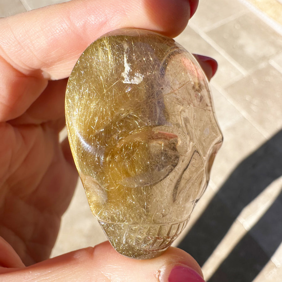 Golden Rutile Quartz Palm Crystal Skull Carved by Leandro de Souza