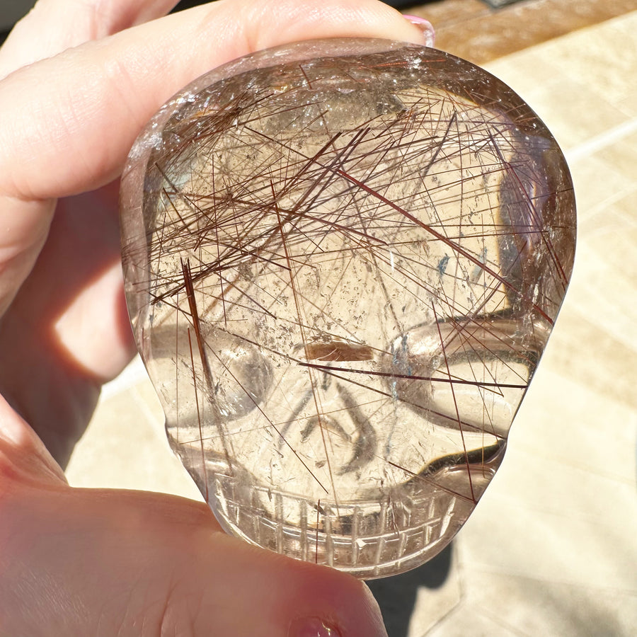 Pink Rutile Quartz Palm Crystal Skull Carved by Leandro de Souza