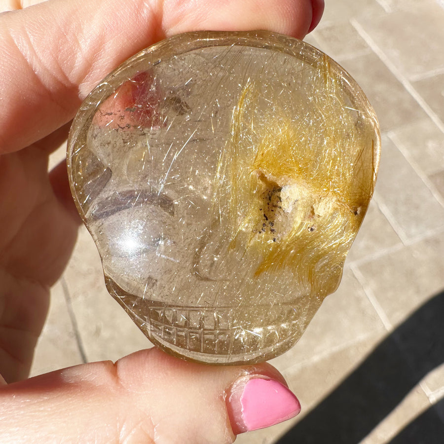 Golden Rutile Quartz Palm Crystal Skull Carved by Leandro de Souza