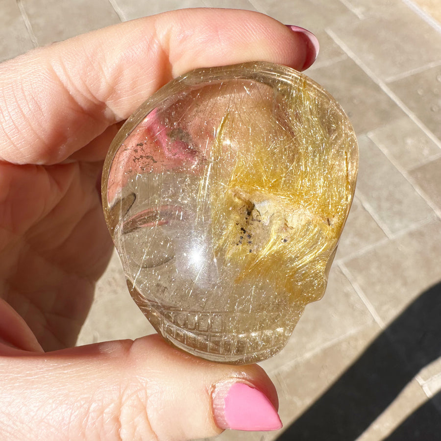 Golden Rutile Quartz Palm Crystal Skull Carved by Leandro de Souza