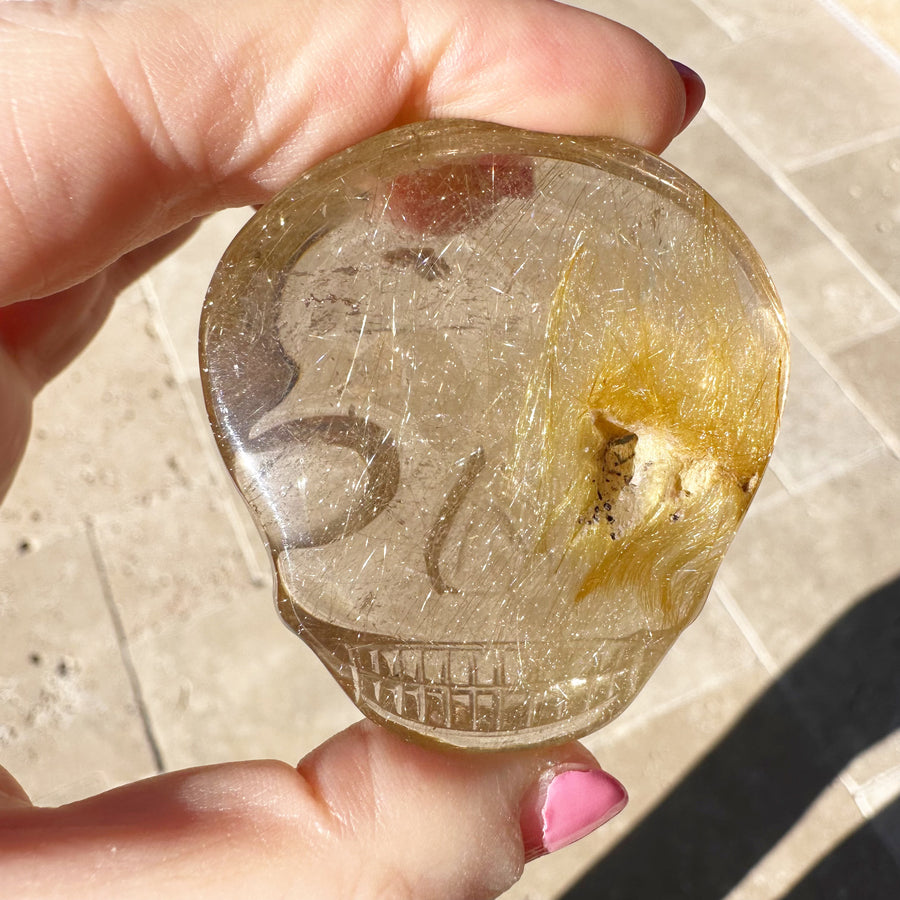 Golden Rutile Quartz Palm Crystal Skull Carved by Leandro de Souza