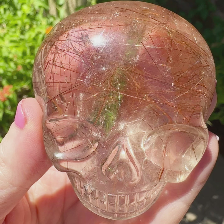 Pink Rutile Quartz Palm Crystal Skull Carved by Leandro de Souza