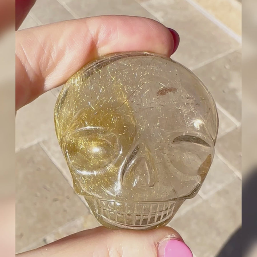 Golden Rutile Quartz Palm Crystal Skull Carved by Leandro de Souza