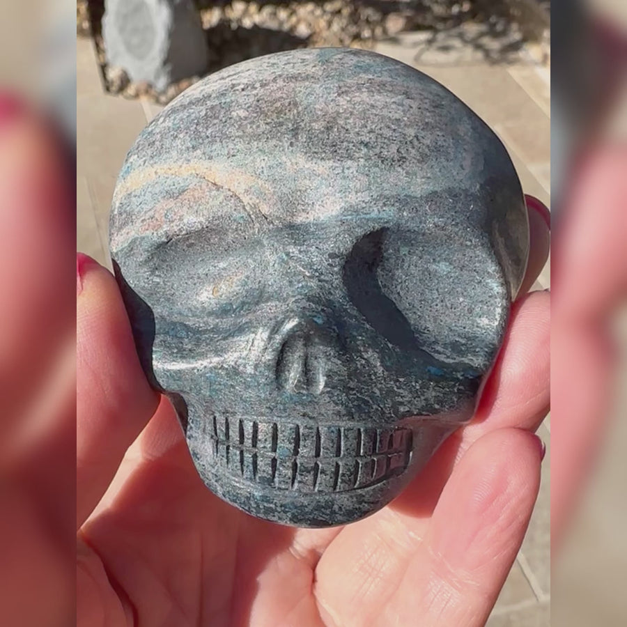 Blue Richterite Palm Crystal Skull Carved by Leandro de Souza